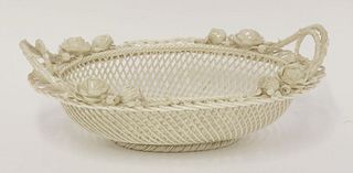 A Belleek woven Basket, c.1870, of deep oval form, the