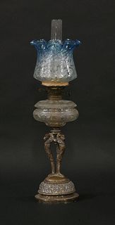 A Victorian oil lamp, the silver-plated bird base with