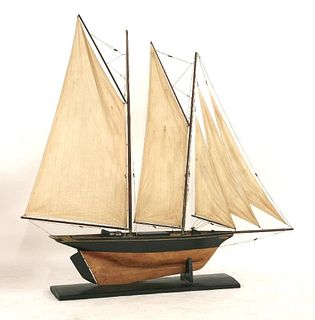 A pond yacht, modelled as a twin-masted ketch, named on