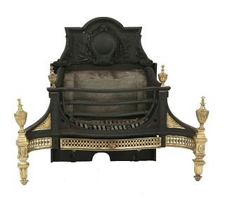 A cast iron fire basket, the slight serpentine basket