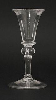 A rare deceptive Gin Glass, c.1730, having a waisted