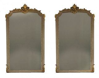 A pair of pier mirrors, the shaped rectangular plates
