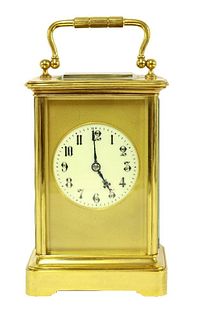 A giant French brass carriage clock, the gilt face