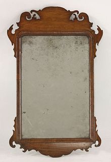 A George III mahogany fret cut mirror, 87cm high