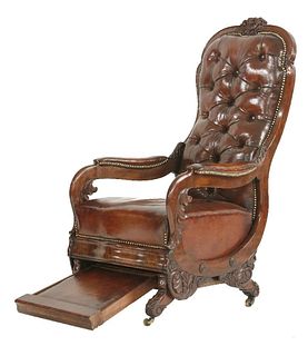 A William IV mahogany library armchair, a leather