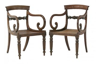 A pair of Regency rosewood armchairs, with plain top