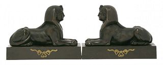 A pair of bronze sphinxes, late 19th century, each