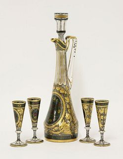 An enamelled and gilt Decanter, Stopper and four