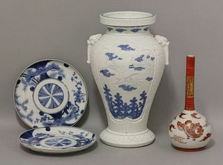 An Hirado Vase, c.1860, moulded with cranes over flying