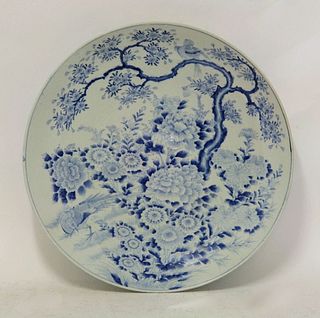 A large blue and white Dish, late 19th century, painted