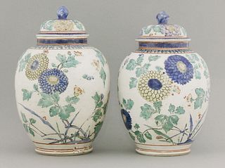 An attractive pair of ko-Imari Jars and Covers, c.1670,