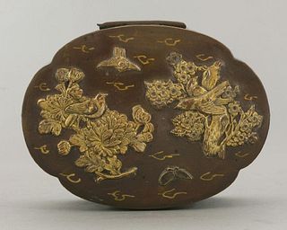 A bronzed metal Box, late 19th century, of tsuba form,