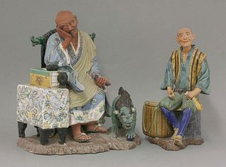 A Kyoto Group,mid 19th century, of a man staring at his