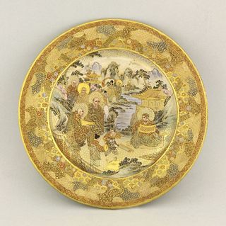 A Kyoto 'Satsuma' Plate, c.1880, richly enamelled and