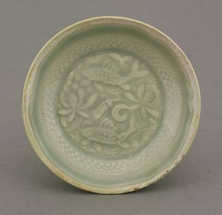 A good and unusual Qingbai moulded small Dish,