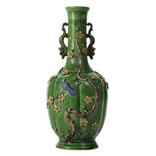 A GREEN-GLAZED 'DRAGON' VASE WITH HANDLES
