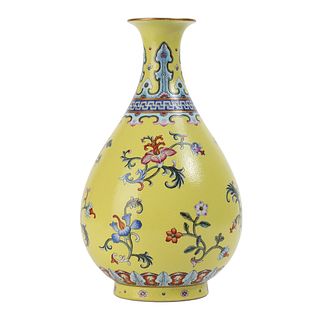 A YELLOW-GROUND FAMILLE-ROSE FLORAL VASE