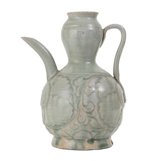 A QINGBAI CARVED FLORAL EWER