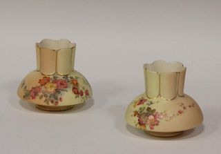 Two similar Royal Worcester blush ivory squat vases, floral painted, puce marks, 3 dots and 2 dots,