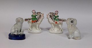 A pair of small Victorian Staffordshire pottery figures of young ladies on goats together with two d