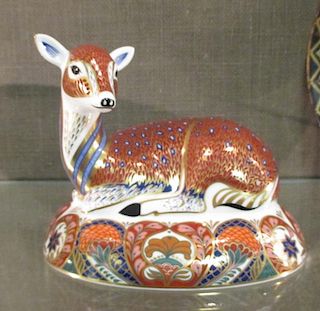 A Royal Crown Derby model of a fawn, 16cm length <br> <br>