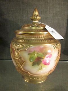 An early 20th century Worcester pot pourri vase and cover painted with roses, 18cm high <br> <br>