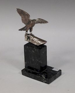 A silver plated figure of a hawk on a marble base, by Alberty <br> <br>