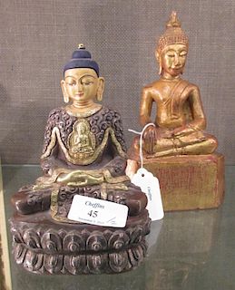 A 20th century Tibetan Buddha and another wooden Buddha 19cm high <br> <br>