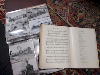 An album of railway and other postcards together with sheet music, a watercolour of a sybil and two