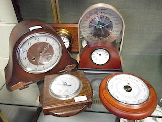 A 20th century multi time zone clock, barometers and other clocks (6) <br> <br>