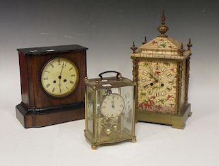 A ceramic faux brick cased mantle clock and two other clocks (3) <br> <br>
