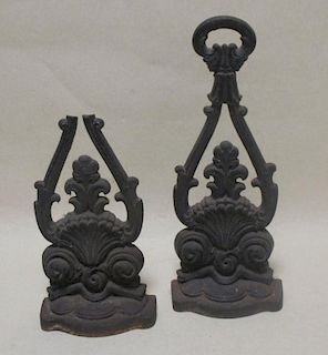 A pair of 19th century cast iron door stops, one a/f <br> <br>