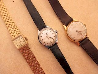 A 9ct gold Rotary lady's wristwatch, a Unitas Ultra wrist watch and another (3) <br> <br>