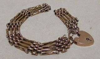 A four bar gate bracelet with padlock clasp (damaged), 15g <br> <br>