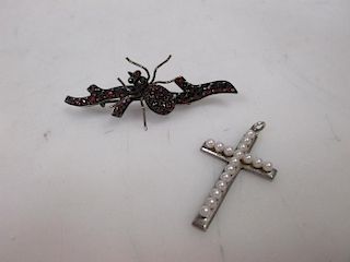 A garnet spider bar brooch and a pearl and silver cross pendant (2) <br> <br>