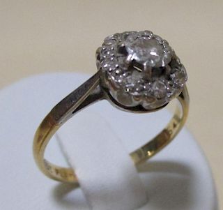An 18ct and platinum diamond cluster ring, an 18ct four stone diamond ring, a 10k diamond set horses