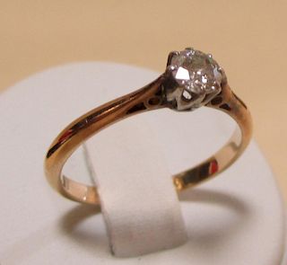 A diamond solitaire ring, the round brilliant cut diamond, estimated 0.3cts, claw set in white metal