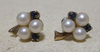 A pair of pearl and sapphire cluster ear studs <br> <br>
