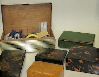 A collection of small boxes, including a tortoiseshell example, two lacquer boxes, a cloisonne box,