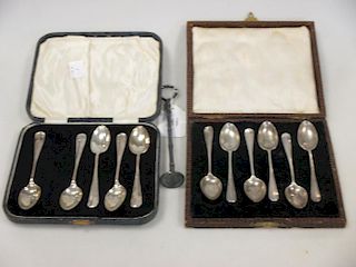 A set of six and another set of five silver coffee spoons and an electroplate swizzel stick <br> <br
