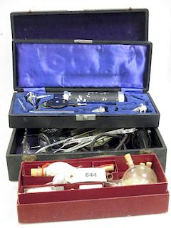 A quanity of early to mid 20th century medical equipment contained in a leather suitcase <br> <br>