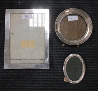 Three small silver photograph frames <br> <br>
