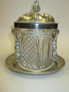 A Victorian cut glass biscuit barrell in elaborate electroplate frame by Martin & Hall <br> <br>