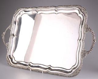 A LARGE 19TH CENTURY SILVER-PLATED SALVER, oval, with egg and tongue border