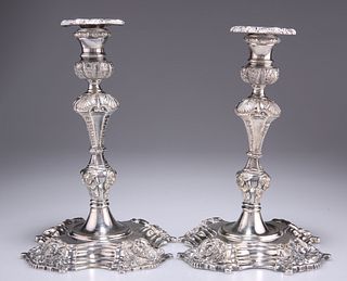 A PAIR OF BAROQUE REVIVAL SILVER-PLATED CANDLESTICKS, 19th Century, each ca