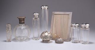 A GROUP OF SILVER, including silver-topped jars, silver-topped scent bottle