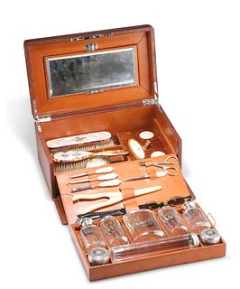 A LATE VICTORIAN LEATHER VANITY CASE, the silver by?William Amaziah Ellwick