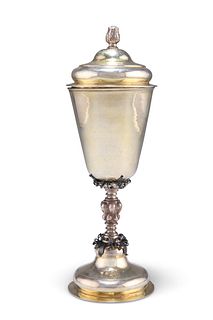 AN 18TH CENTURY RUSSIAN PARCEL-GILT SILVER CUP AND COVER, the domed lift-of