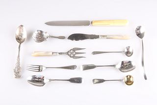 A GROUP OF SILVER, including a Continental caddy spoon, breadknife, America