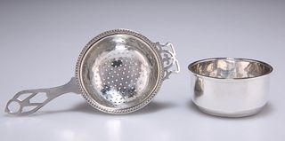 A GEORGE V SILVER TEA STRAINER ON STAND,?by Adie Brothers Ltd, Birmingham 1